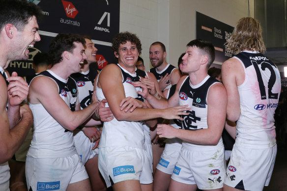 Charlie Curnow is the centre of attention as the Blues celebrate a rare win at the Adelaide Oval.