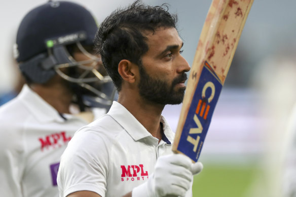 A restrained Ajinkya Rahane celebrates what could prove a crucial century at the MCG.