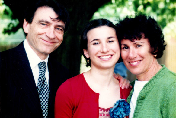 Elissa Goldstein with her parents, Jacob and Deidre, at her high school graduation in 2001.