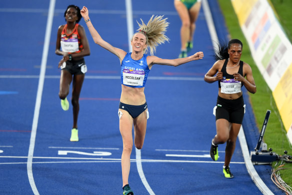 Eilish McColgan celebrates her stirring 10,000m triumph, three laps ahead of Lesotho’s Mathakane Letsie (right).