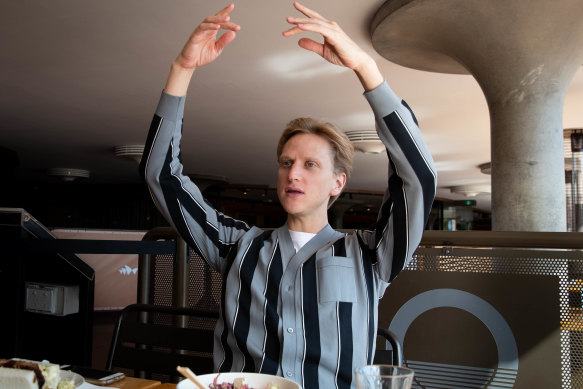 Can’t help himself:  David Hallberg’s ballet arms demonstrate a point over lunch.