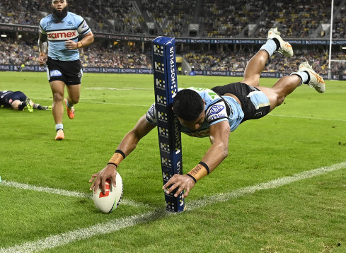 Ronaldo Mulitalo scores a spectacular try in the corner for the Sharks.