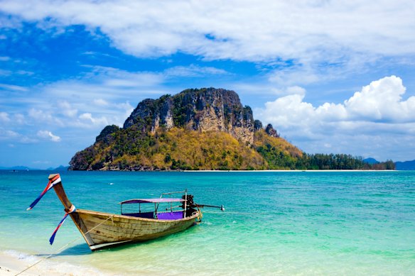 A longtail boat at the beach in Krabi Provence.