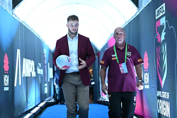 Peas in a playmaking pod: Maroons halfback Sam Walker - with footy in hand as usual, and Alfie Langer.