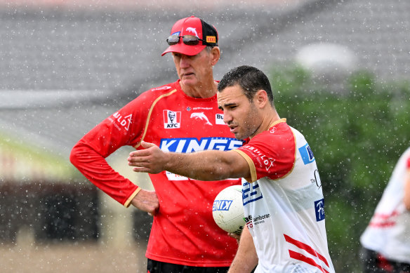 ‘He makes me feel special’: Sean O’Sullivan talks tactics with Wayne Bennett during a Dolphins training session at Kayo Stadium. 