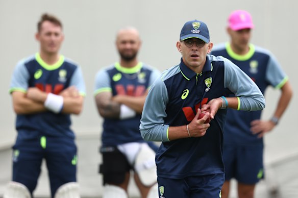 Marnus Labuschagne, Jake Weatherald and Scott Boland watch Murphy in action.
