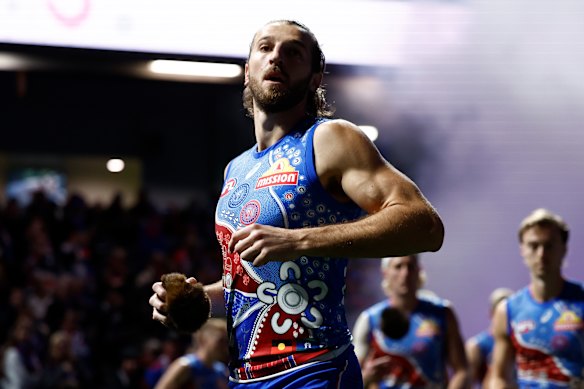 The Bulldogs’ Marcus Bontempelli hols a possum skin ball before Saturday night’s game against Essendon.