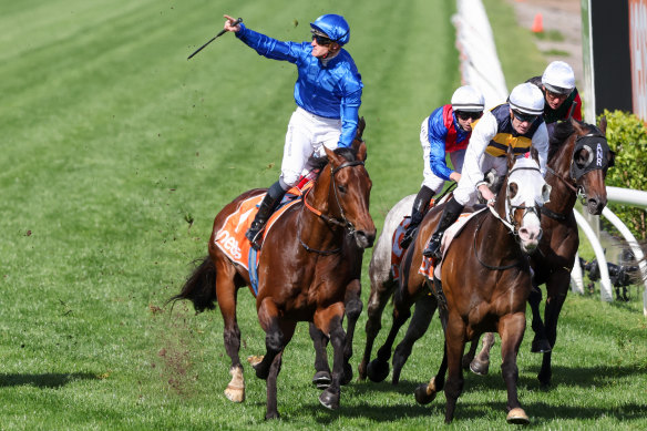 Anamoe, with James McDonald aboard, salutes past the finishing post.