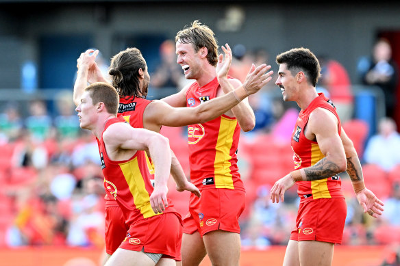 Jack Lukosius celebrates one of his five goals for the Suns.