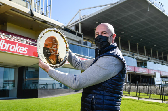 Moonee Valley Racing Club chief executive Michael Browell with the gold 100th Cox Plate.