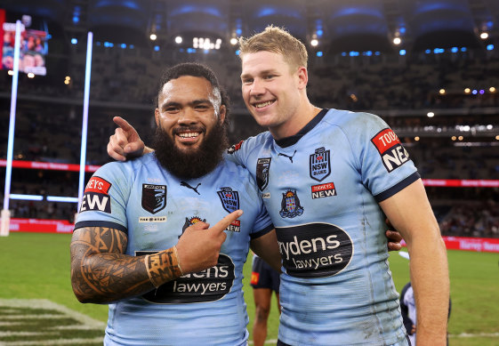 Blues rookies Siosifa Talakai and Matt Burton soak up a resounding win.