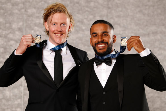 Clayton Oliver and Gold Coast’s Touk Miller shared this year’s AFL Coaches Association champion player award.