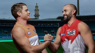 Heath and Rhyce Shaw share a moment in 2015, when Rhyce played for the Swans.
