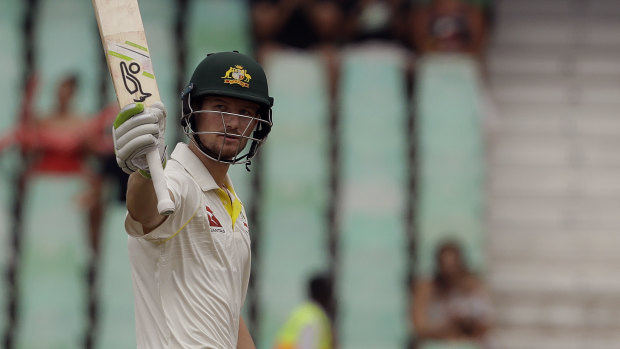 Redemption: Cameron Bancroft acknowledges the crowd after reaching his half-century at Kingsmead stadium in Durban.