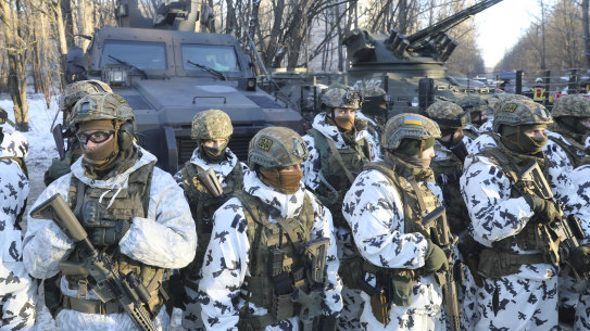 Ukrainian National Guard and special operations units simulate a crisis situation in an urban settlement, in the abandoned city of Pripyat near Chernobyl.