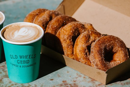 Old Wheels Grind serves coffee and doughnuts from the back of a ute.