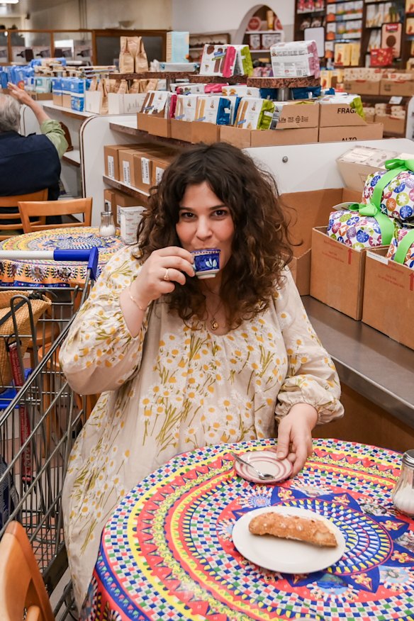 Julia Busuttil Nishimura taking a shopping break for a $2 espresso and a ricotta cannoli.