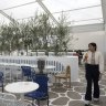 Olympia Wine’s rooftop is all blue and white.