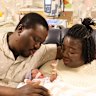 Belinda and Emmanuel with two of their four newborns.