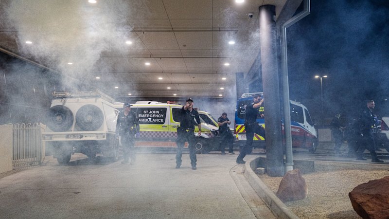 Chaos erupts as angry crowds converge on hospital after arrest of fugitive Jefferson Lewis