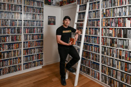 “The idea that something could be lost to time worries me”: Leslie Haworth among the 4,500 DVDs in his collection.