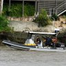Brisbane River search called off after man seen swimming across