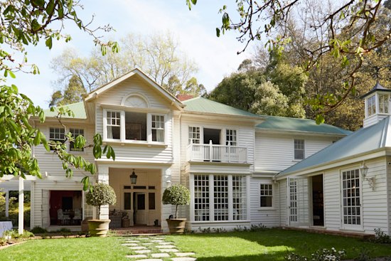 “When we converted the garage into our kitchen, Paul Bangay redesigned the garden by raising the level and planting a lawn where it was once a gravel drive.”