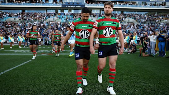 Cody Walker helps Jai Arrow out onto the field on the Gold Coast.