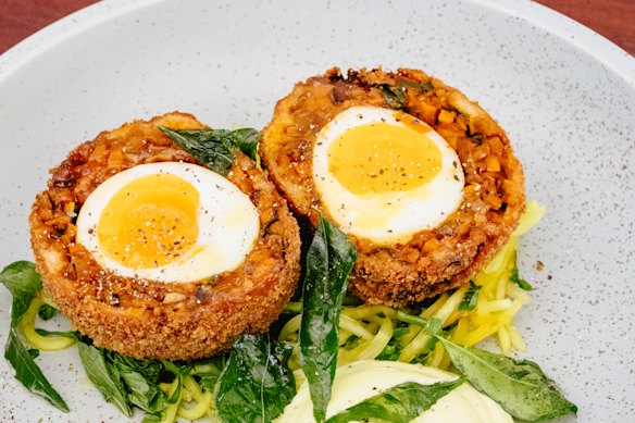 Spiced carrot scotch egg with pickled papaya.