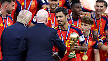 Spain’s Rodri is presented the FIFA World Cup.