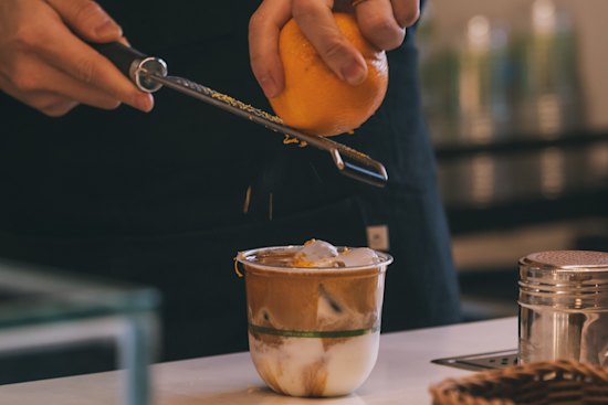 Tone Coffee’s “tiger bomb” coffee featuring fresh orange zest.