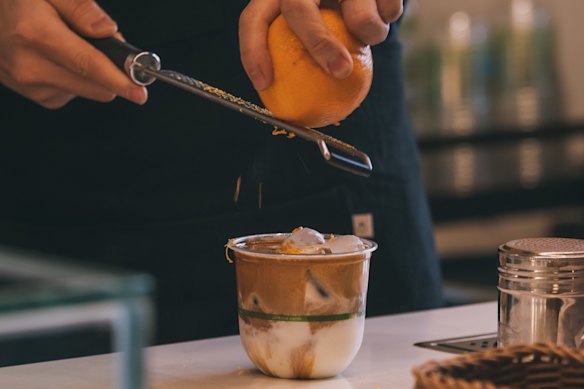 Tone Coffee’s “tiger bomb” coffee featuring fresh orange zest.