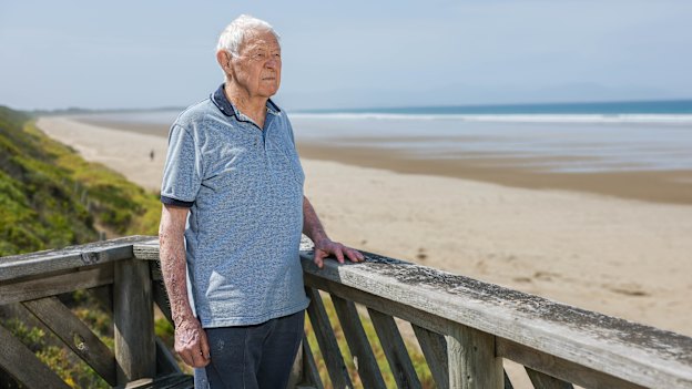 Retired Foster police sergeant Jim Lowe at Waratah Bay in South Gippsland, where a windsurfer was last seen in the 1980s.