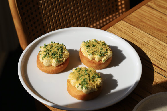 Whipped roe with chives and bottarga on panisse