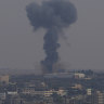 Smoke rises after Israeli airstrikes on residential building in Gaza, on Saturday, August 6.