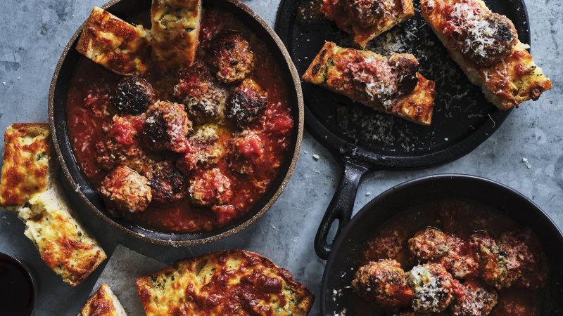 Mouthwatering oven-baked meatballs in a rich tomato sauce