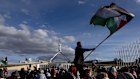 A pro-Palestine protest takes place on the lawns in front of Parliament House ahead of the opening of the 48th Parliament.