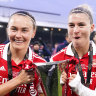 Caitlin Foord (left) and Steph Catley after their League Cup triumph with Arsenal in March.