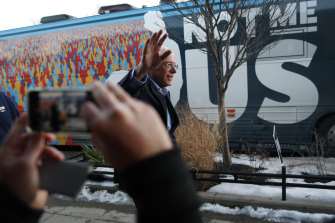 Democratic presidential candidate Senator Bernie Sanders approaches his campaign bus after speaking at a Super Bowl watch party campaign event in Des Moines, Iowa.