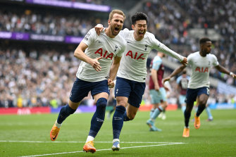 Harry Kane celebrates with Heung-Min Son after scoring for Tottenham.