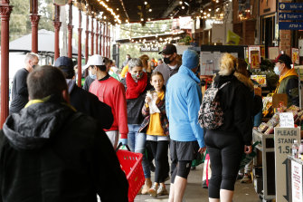 People shopping at the South Melbourne market.