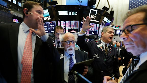 The tide's gone out: New York Stock Exchange Floor Governor Brendan Connolly with traders on the floor of the NYSE amid this week's market carnage.