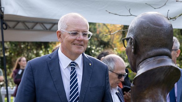 Scott Morrison comes face to face with his bronze bust on the Prime Minister’s Avenue in Ballarat in May.