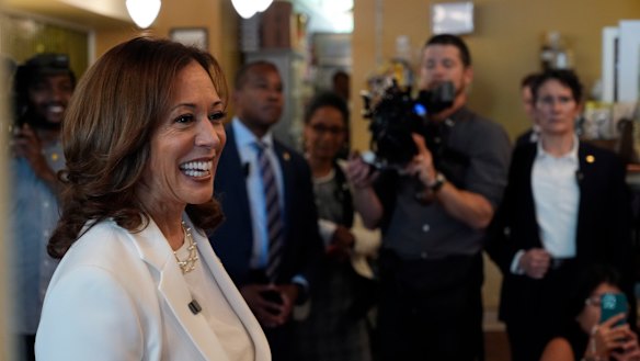 Harris talks during a stop at Dottie’s Market in Savannah.