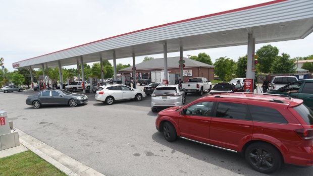 Drivers fill their tanks at the Speedway in East Ridge, Tennessee. 