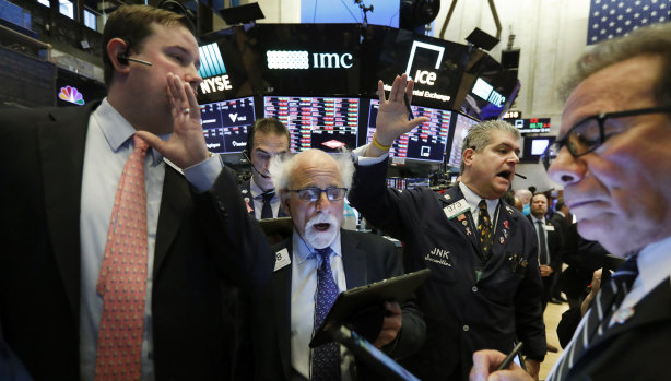 The tide's gone out: New York Stock Exchange Floor Governor Brendan Connolly with traders on the floor of the NYSE amid this week's market carnage.