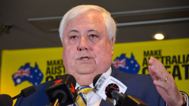 Clive Palmer's party is undecided on the merits of child immunisation.