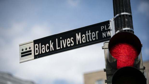 A newly installed street sign designates Black Lives Matter Plaza NW in Washington, DC.