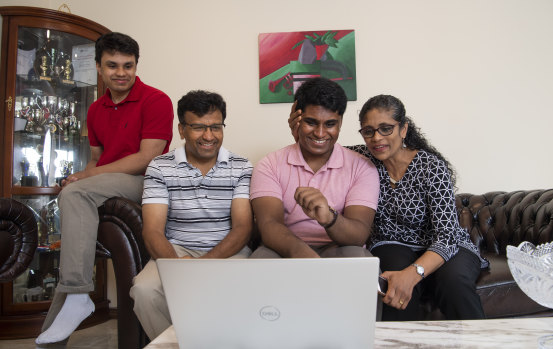 Thinesshan Thevathasan receives his ATAR results with his brother Amerthan, father Nadarajah and mother Sivakumari.