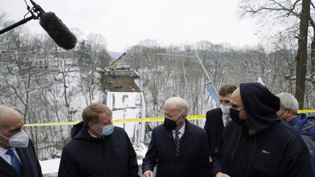 US President Joe Biden visits the site where the Fern Hollow Bridge collapsed.